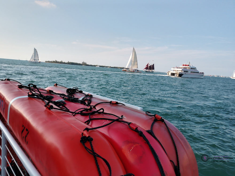 Numerous sailboats and power boats can be seen on the waters off the southern point of Key West ferrying passengers to watch the sunset on your Key West Vacation.